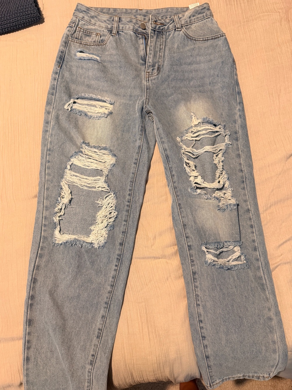Women’s Light Blue Distressed Jeans flare leg